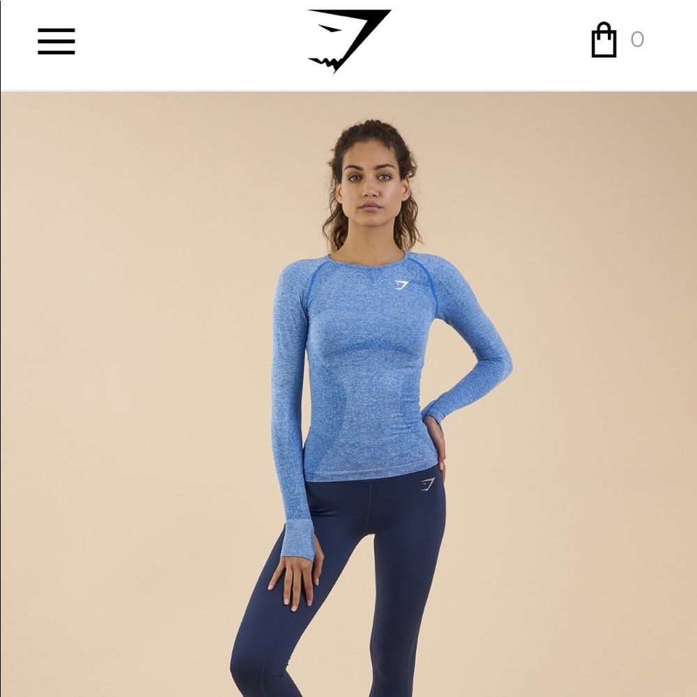 GYMSHARK WOMENS
SEAMLESS LONG SLEEVE TOP
BLUEBERRY